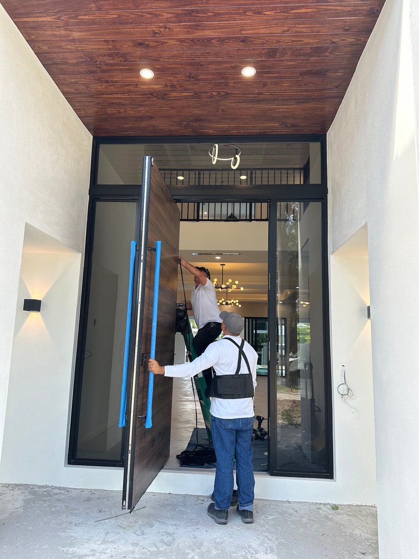 Impact pivot door installation — Royal Palm Dr, Fort Lauderdale