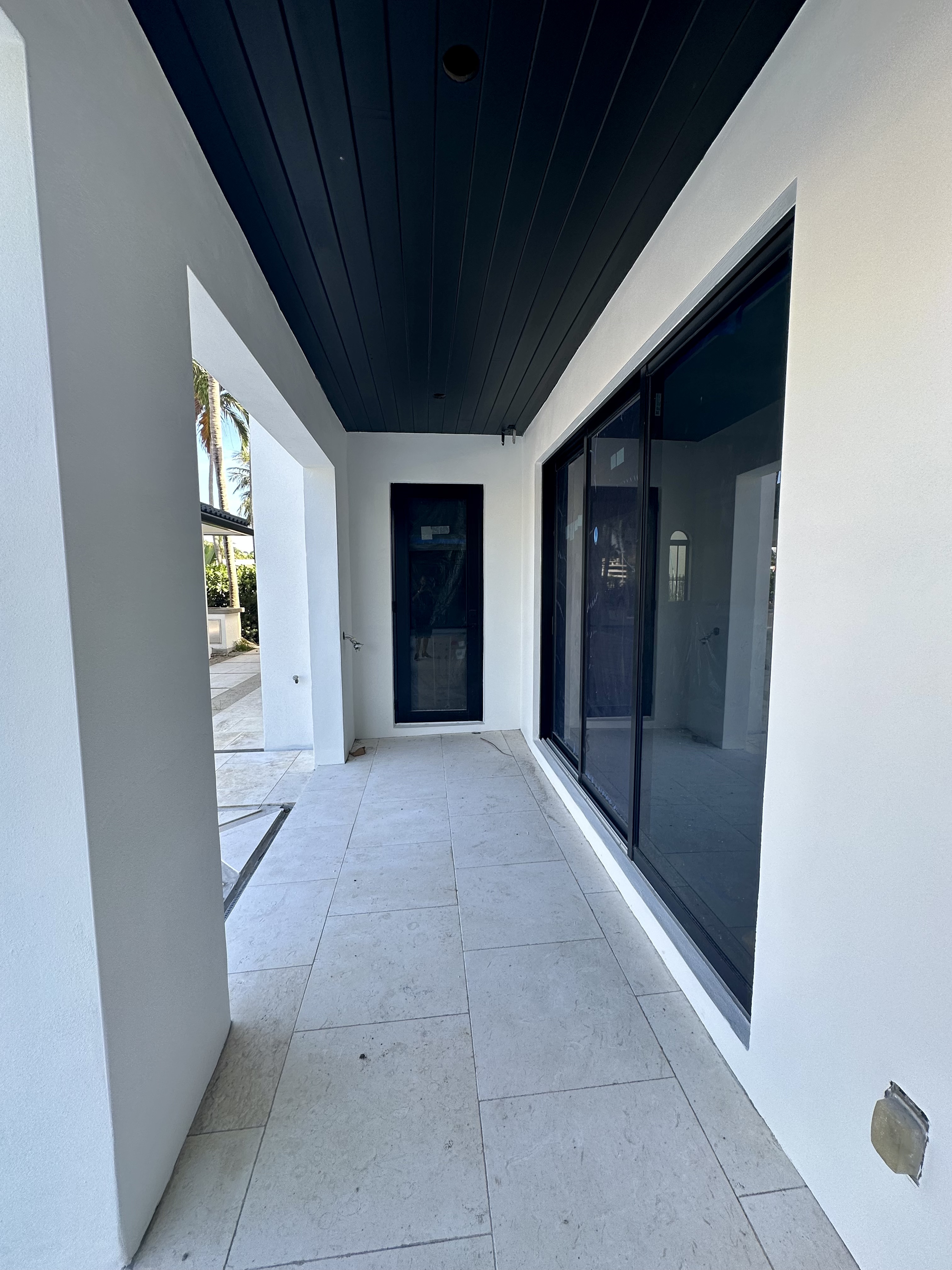 Impact pivot door — 131 Royal Palm Dr, Fort Lauderdale